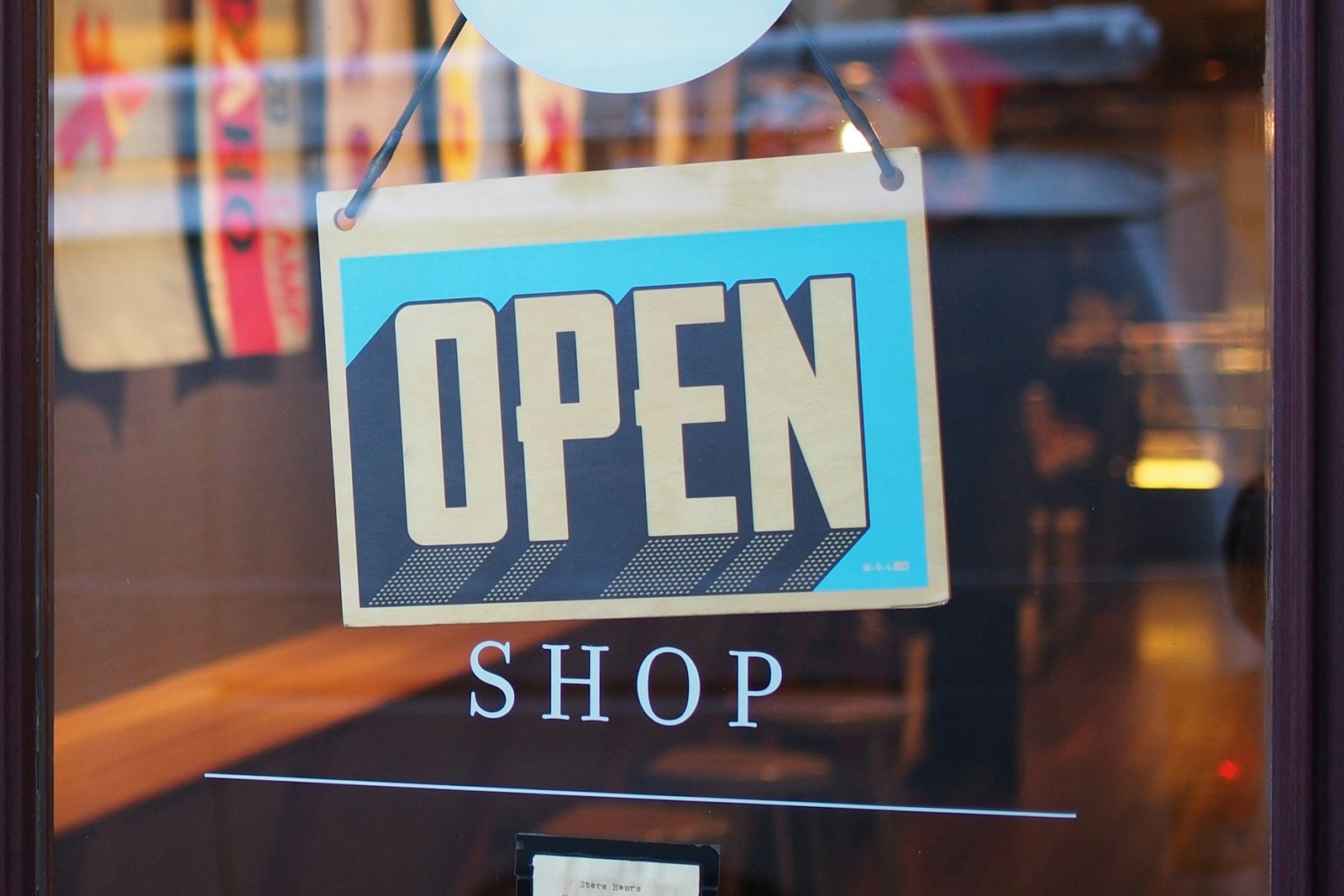 Open sign on a local shop door, illustrating Google Business Profile optimization for Mississauga businesses